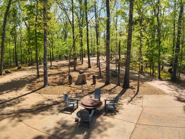 a view of a patio with swimming pool
