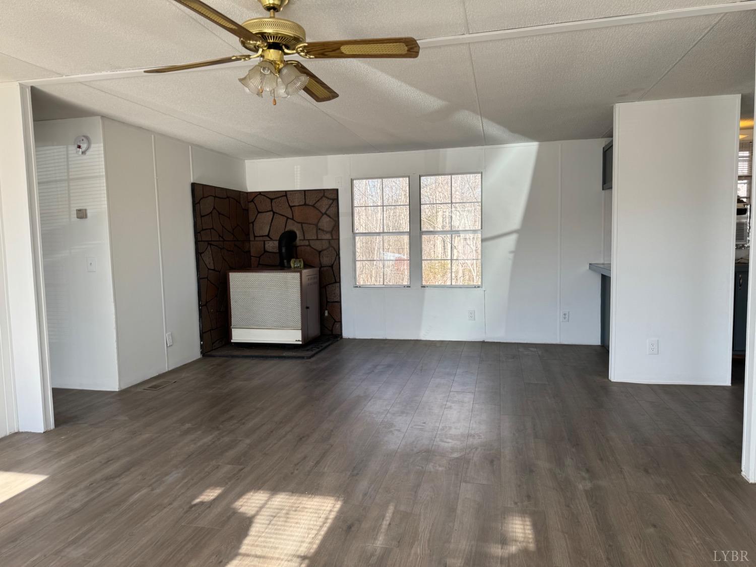 400 Pilot View Road Concord, VA 24538 - Photo 20 of 36 an empty room with wooden floor and windows