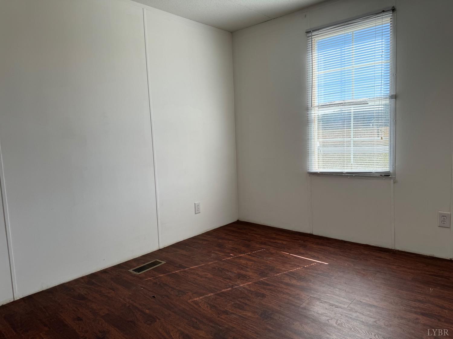 400 Pilot View Road Concord, VA 24538 - Photo 23 of 36 an empty room with wooden floor and windows