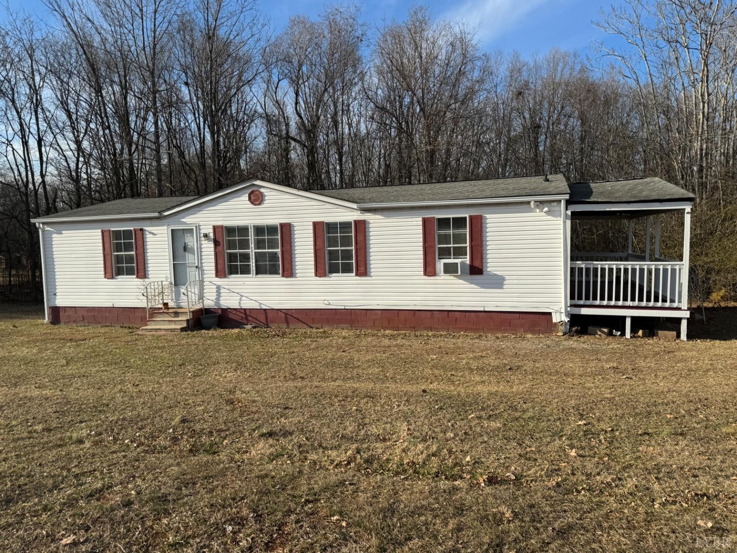 400 Pilot View Road Concord, VA 24538 - Photo 29 of 36 gravel circular drive, vinyl siding, mortared cinder block "skirt"