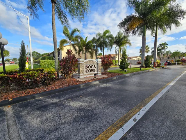 a view of a street with cars