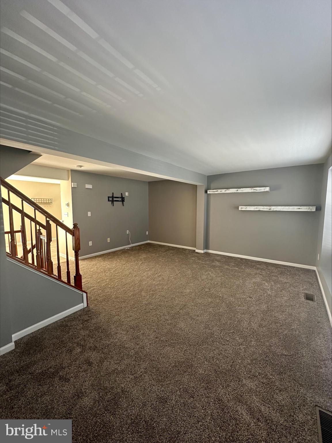 23567 Devonshire Road Millsboro, DE 19966 - Photo 12 of 25 a view of an empty room with windows