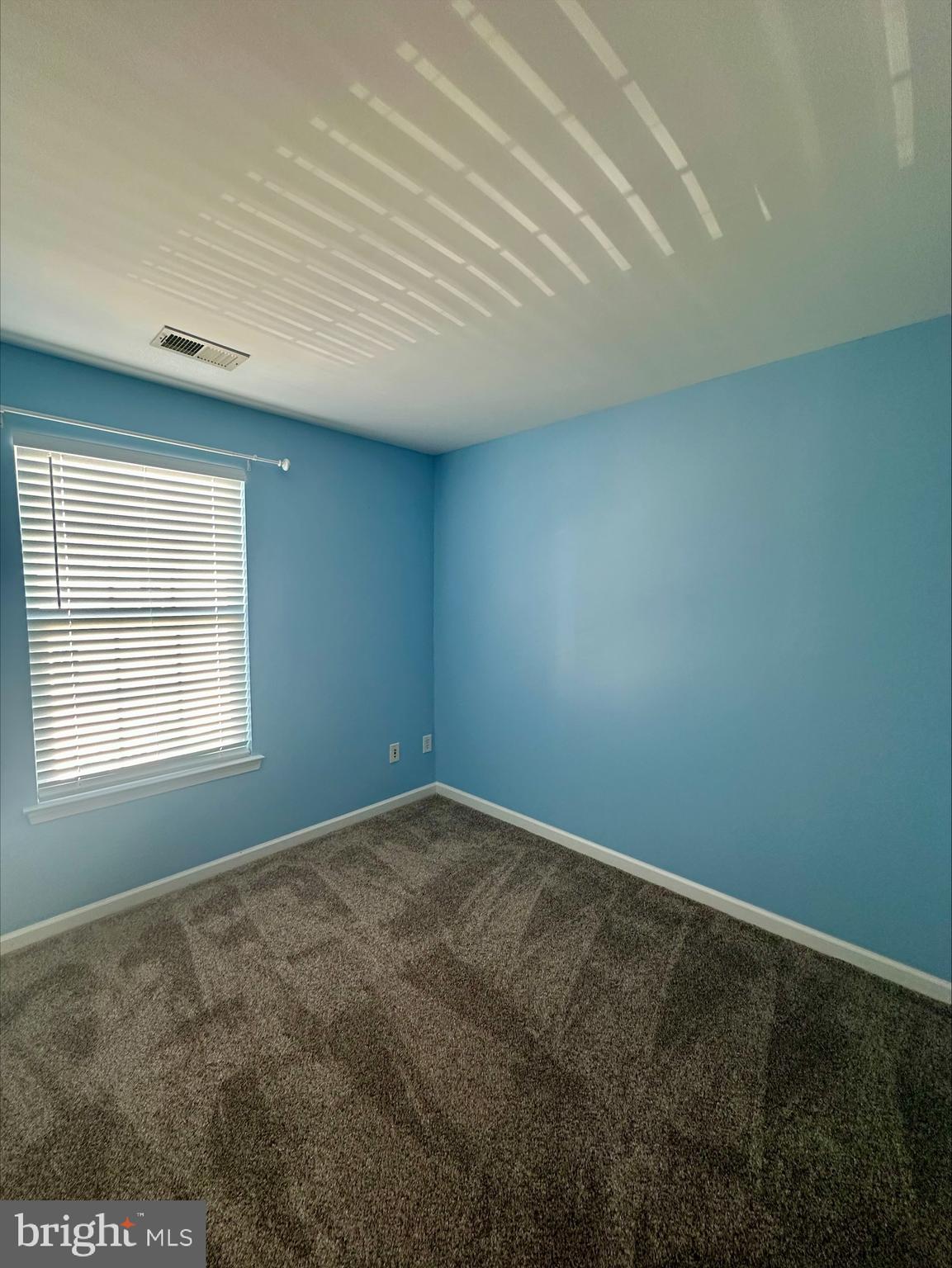 23567 Devonshire Road Millsboro, DE 19966 - Photo 20 of 25 an empty room with a window