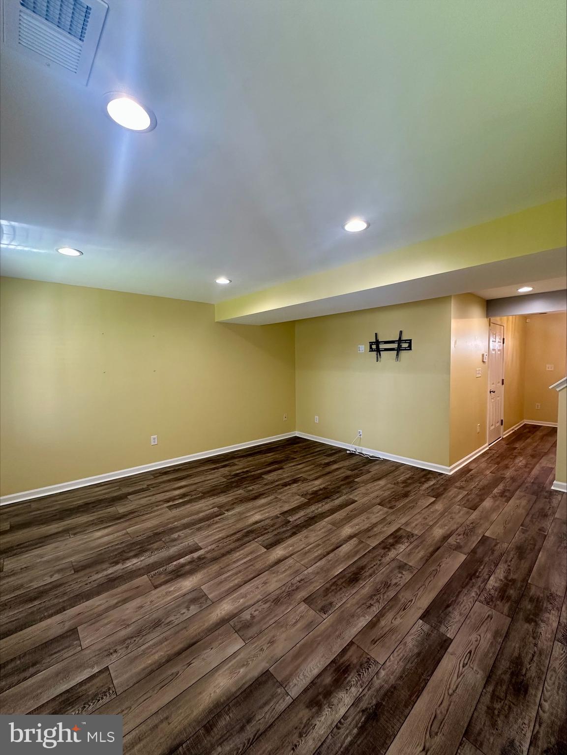 23567 Devonshire Road Millsboro, DE 19966 - Photo 2 of 25 a view of empty room with wooden floor