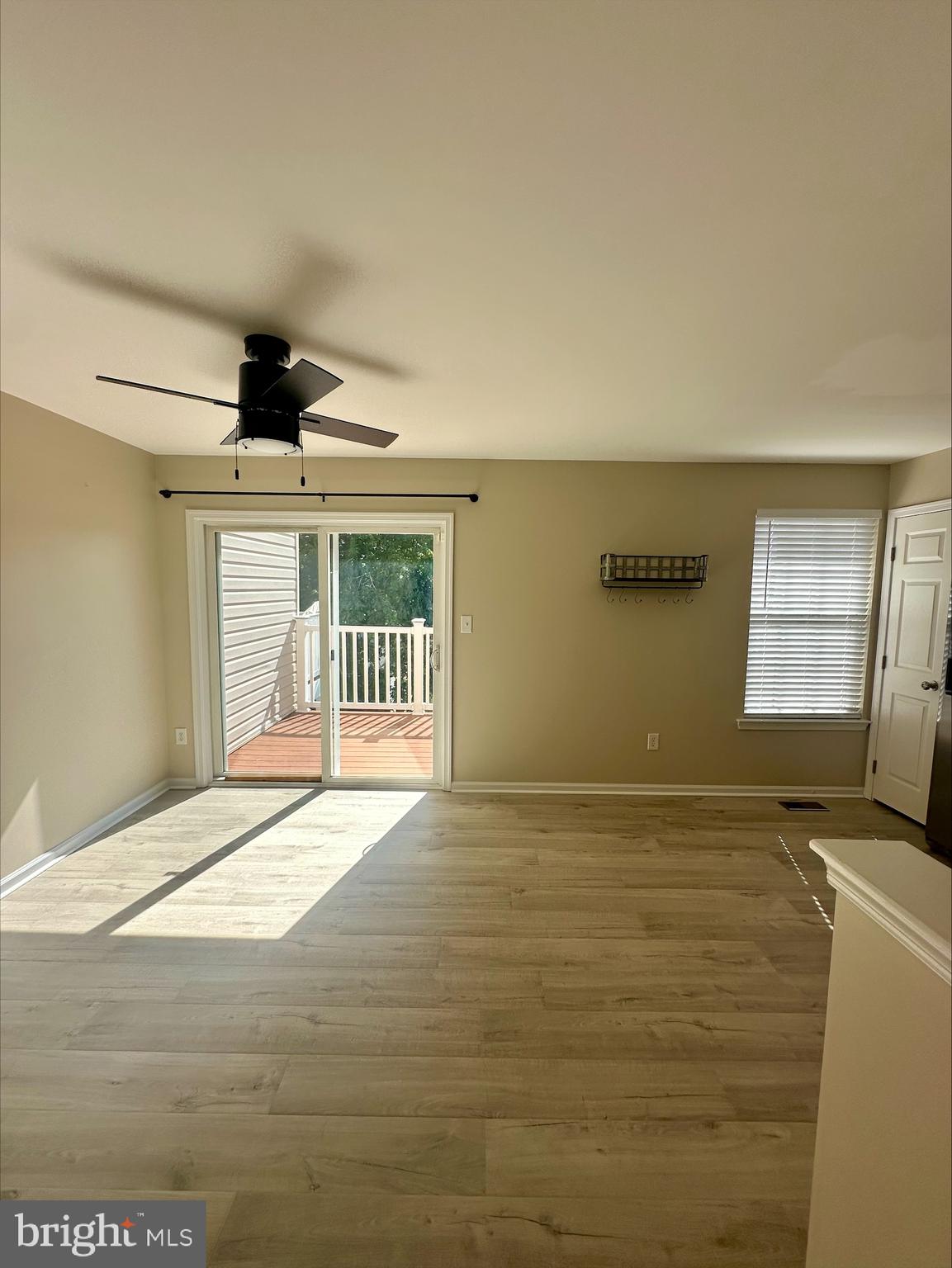 23567 Devonshire Road Millsboro, DE 19966 - Photo 6 of 25 a view of an empty room with a window
