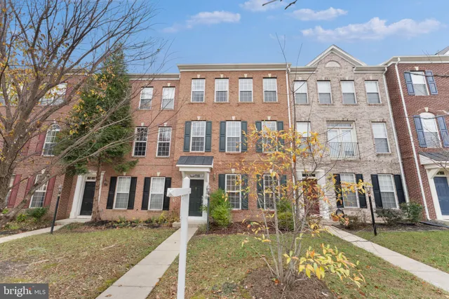 front view of a building with a yard