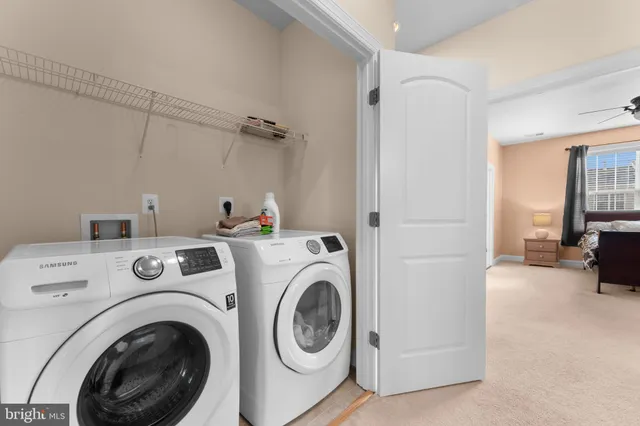 a view of a hall with wooden floor