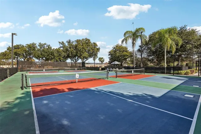 a view of swimming pool with an outdoor space and seating area