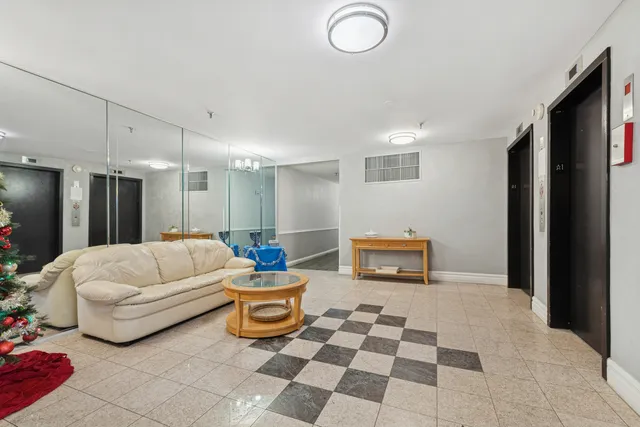 a living room with furniture and a couch