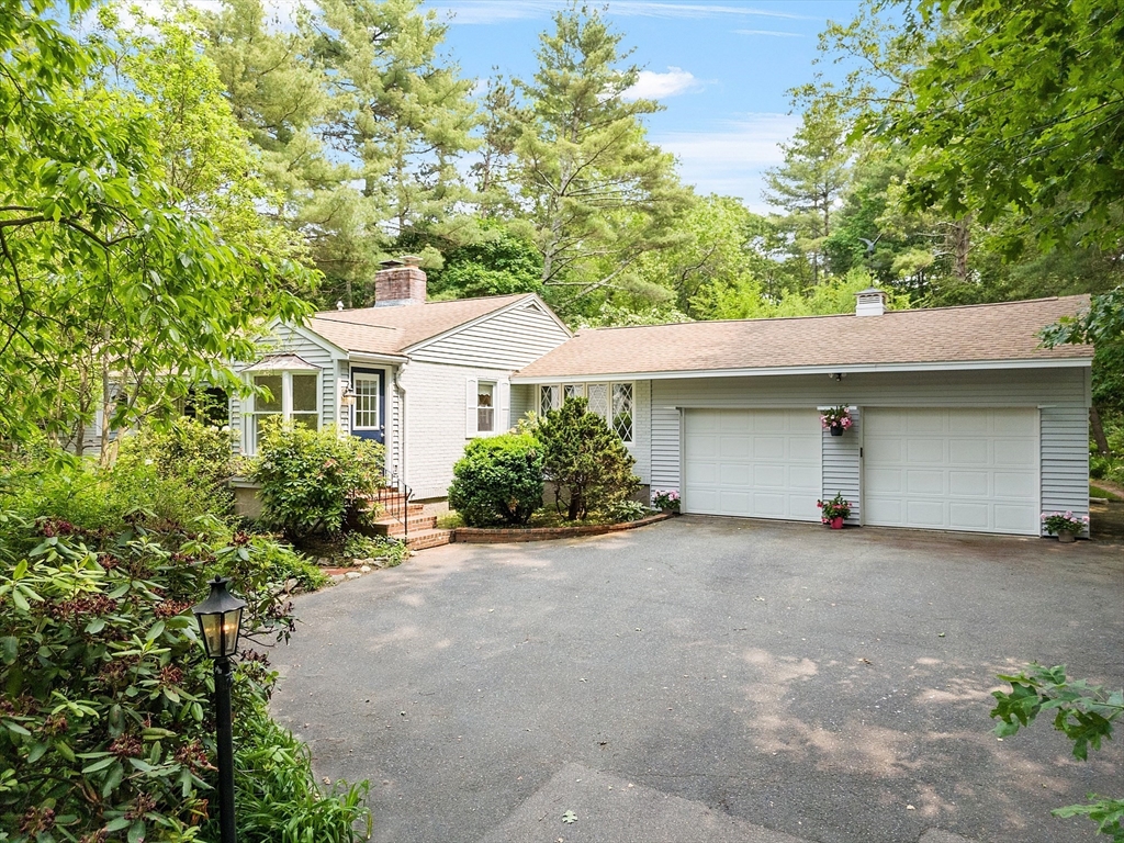 front view of a house with a street