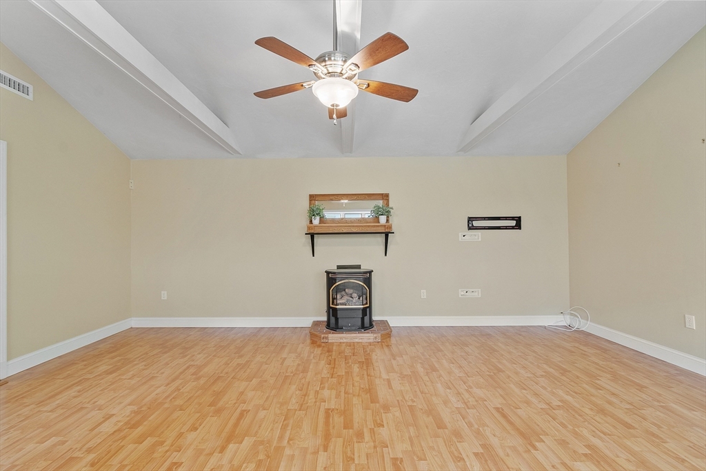 73 Forest Road Millis, MA 02054 - Photo 12 of 34 a view of a livingroom with wooden floor