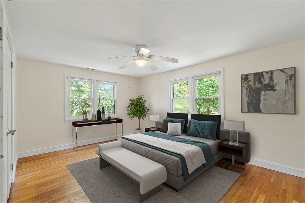 73 Forest Road Millis, MA 02054 - Photo 20 of 34 a bedroom with a large bed and a window