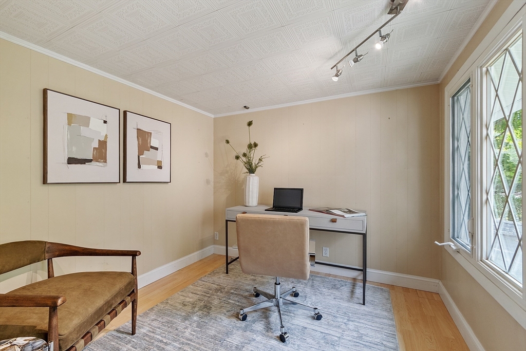 73 Forest Road Millis, MA 02054 - Photo 9 of 34 a view of a workspace with furniture and a window