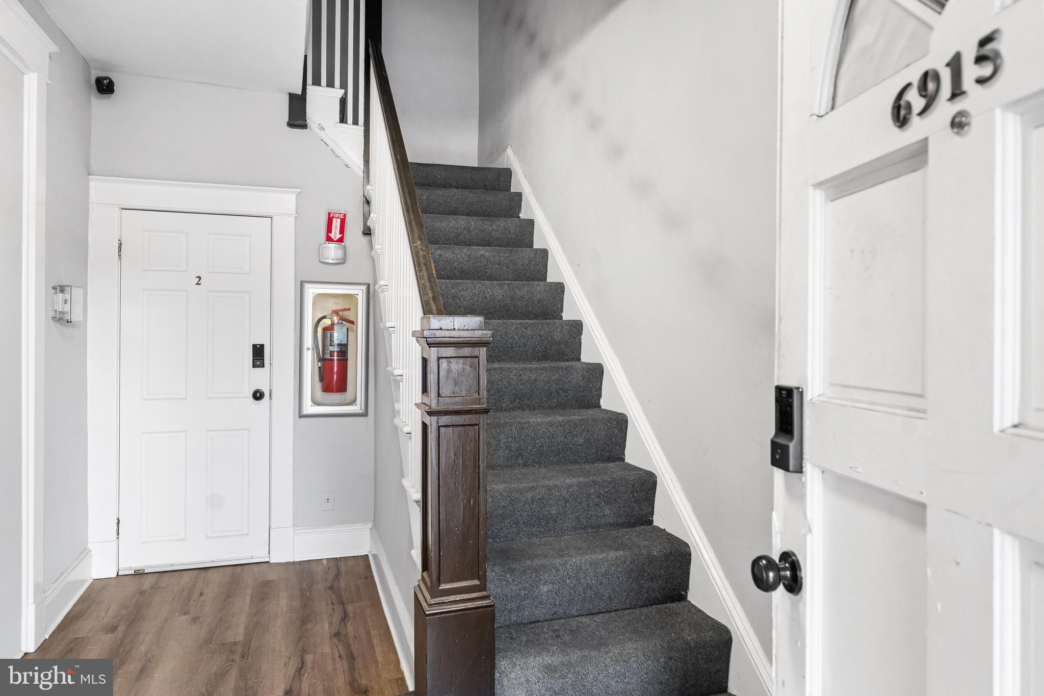 6915 Harford Road, Unit 3 Baltimore, MD 21234 - Photo 14 of 16 a view of entryway and hall with wooden floor
