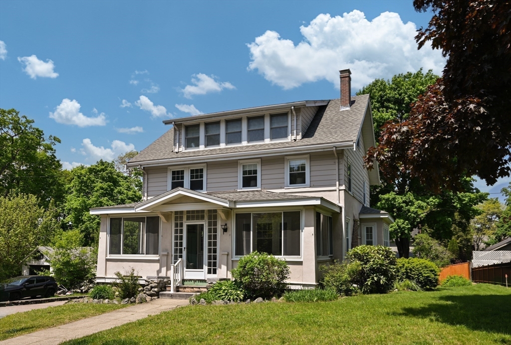 8 Overlook Road Wakefield, MA 01880 - Photo 1 of 41 a front view of a house with garden and trees