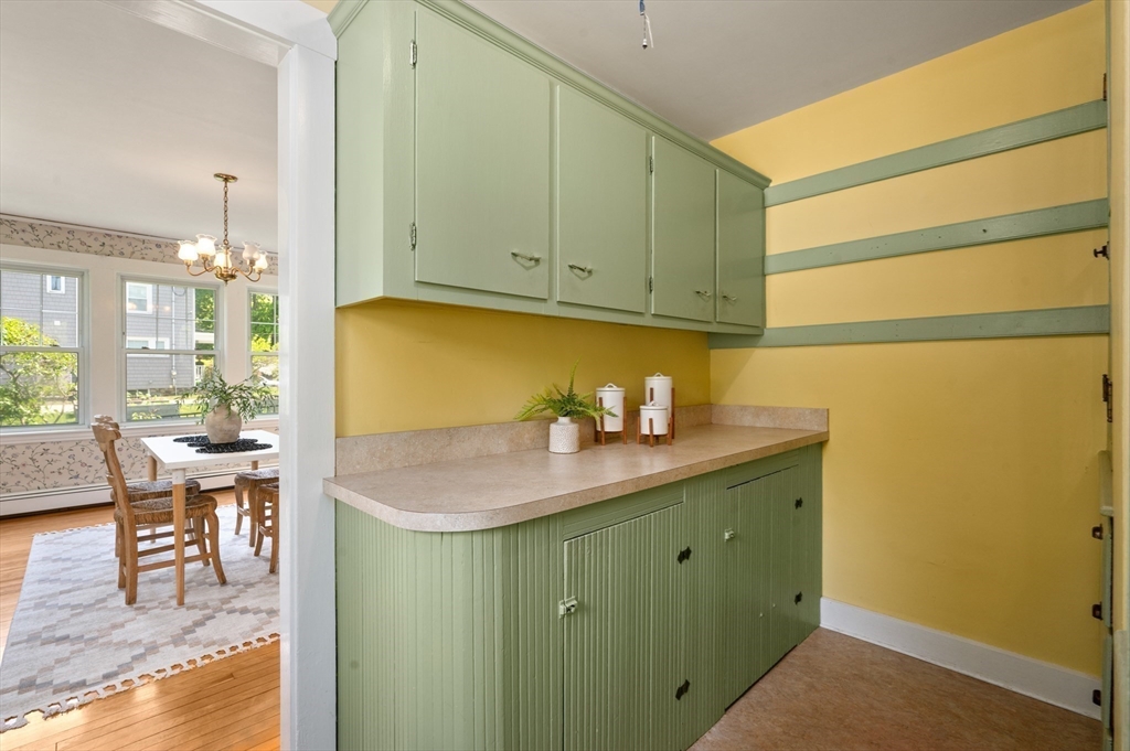 8 Overlook Road Wakefield, MA 01880 - Photo 18 of 41 a room with cabinets and chair