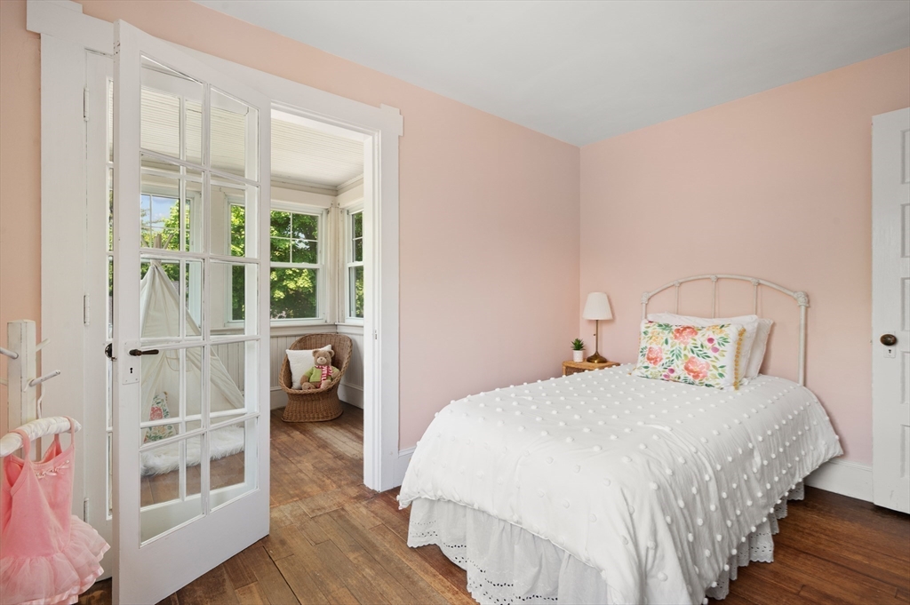 8 Overlook Road Wakefield, MA 01880 - Photo 31 of 41 a bedroom with a bed and a large window