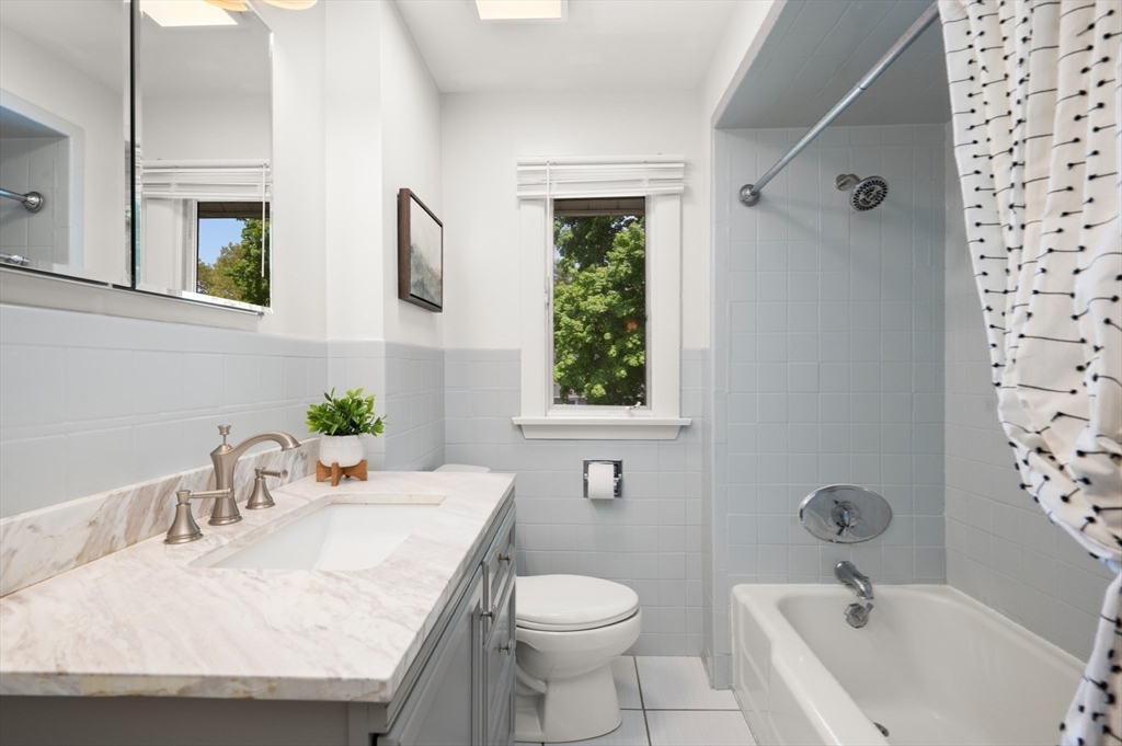 8 Overlook Road Wakefield, MA 01880 - Photo 33 of 41 a bathroom with a granite countertop sink and a mirror