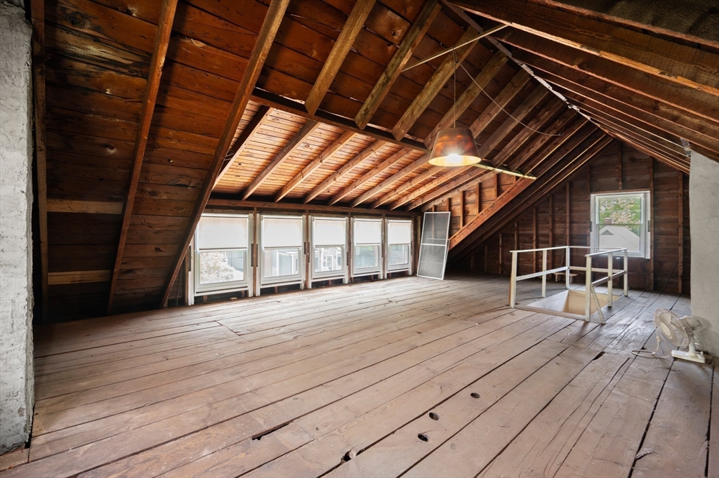 8 Overlook Road Wakefield, MA 01880 - Photo 35 of 41 a view of an empty room with wooden floor and windows