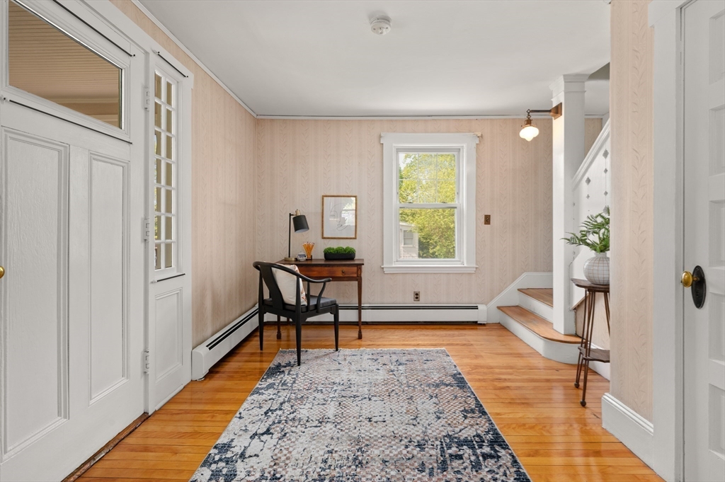 8 Overlook Road Wakefield, MA 01880 - Photo 8 of 41 a living room with furniture and a rug