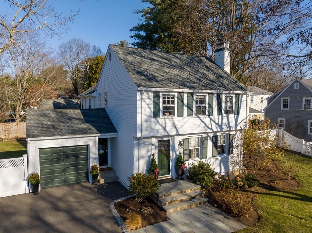 89 Beechwood Road Wellesley, MA 02482 - Photo 1 of 32 a front view of a house with a yard
