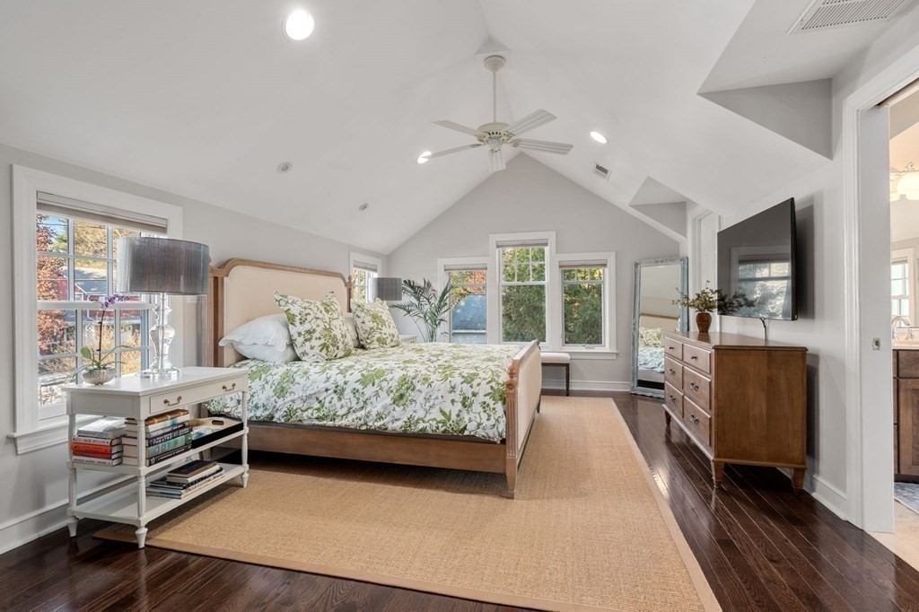 89 Beechwood Road Wellesley, MA 02482 - Photo 11 of 32 a bed room with furniture and a flat screen tv