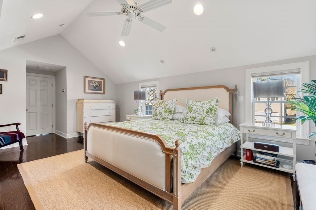 89 Beechwood Road Wellesley, MA 02482 - Photo 12 of 32 a bedroom with a bed and a chandelier
