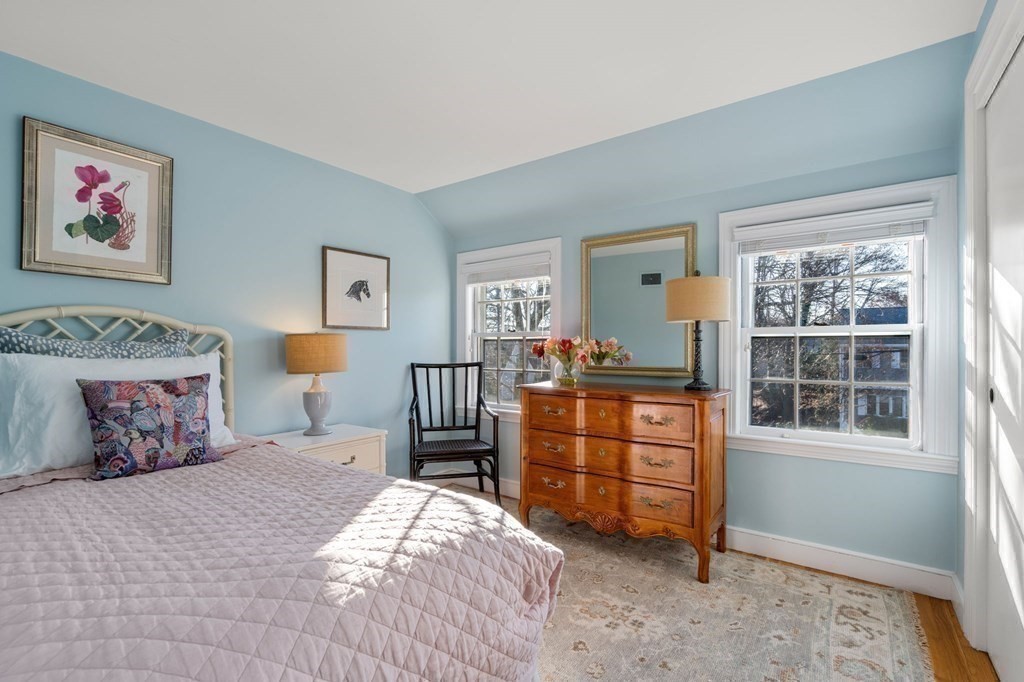 89 Beechwood Road Wellesley, MA 02482 - Photo 15 of 32 a bedroom with a bed and a dresser in it
