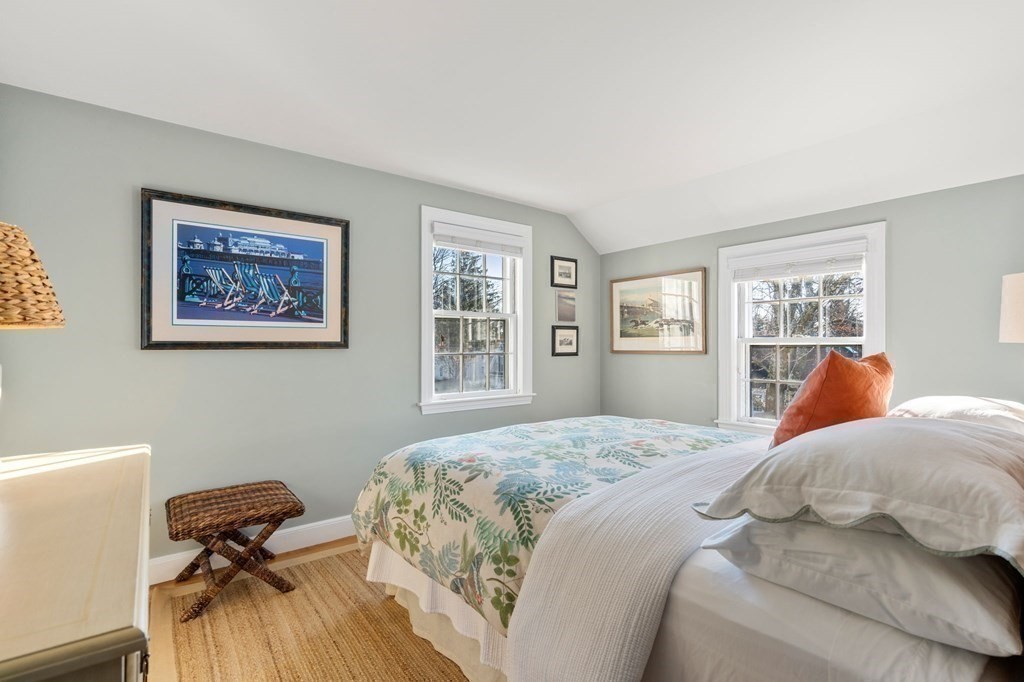 89 Beechwood Road Wellesley, MA 02482 - Photo 16 of 32 a bedroom with a bed and a window