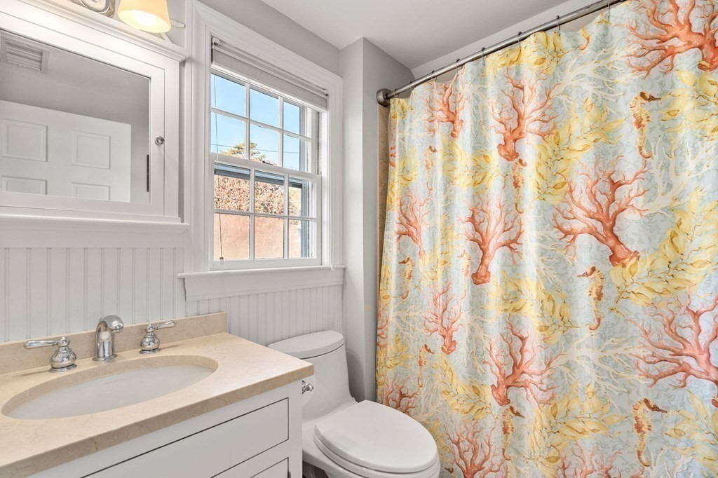 89 Beechwood Road Wellesley, MA 02482 - Photo 17 of 32 a bathroom with a sink toilet and shower