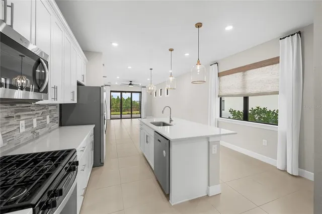 a bathroom with a shower and a sink