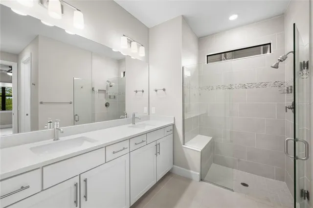 a view of a yard with a tree in the background