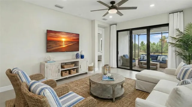 a kitchen with kitchen island a sink stainless steel appliances and cabinets