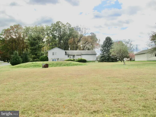 a bathroom with a sink and a yard