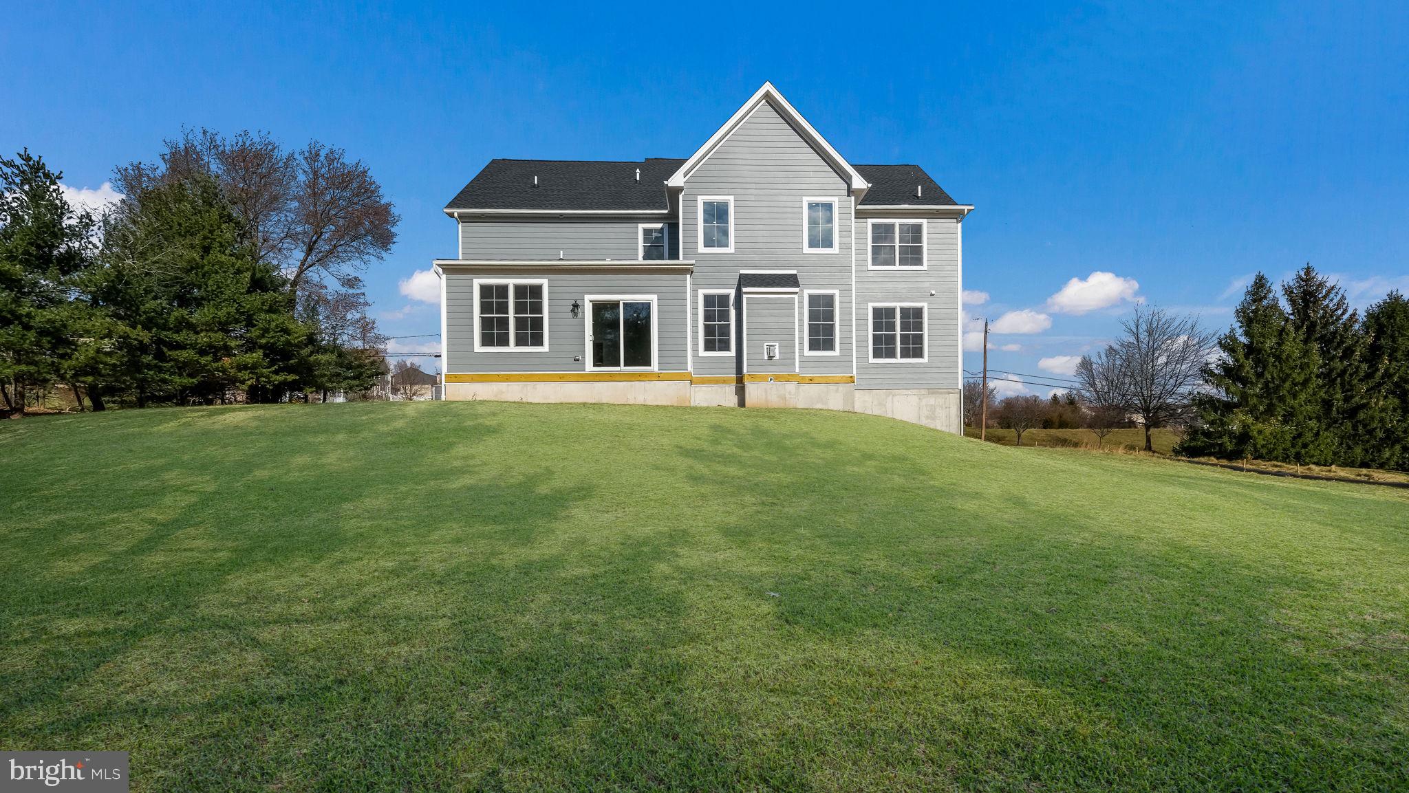 2550 Rickert Road Perkasie, PA 18944 - Photo 69 of 73 a front view of a house with a yard