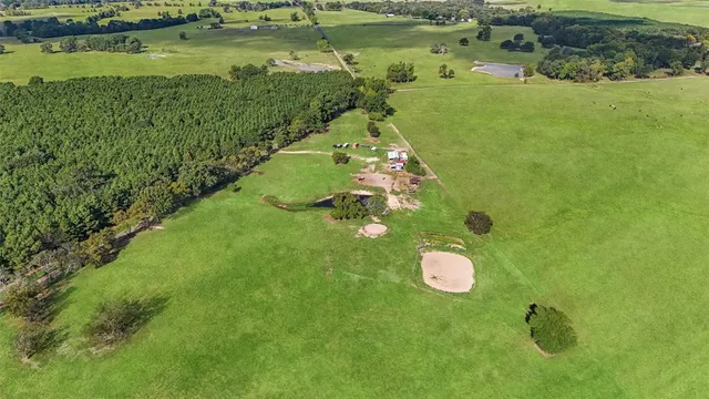 a view of a lake with a yard
