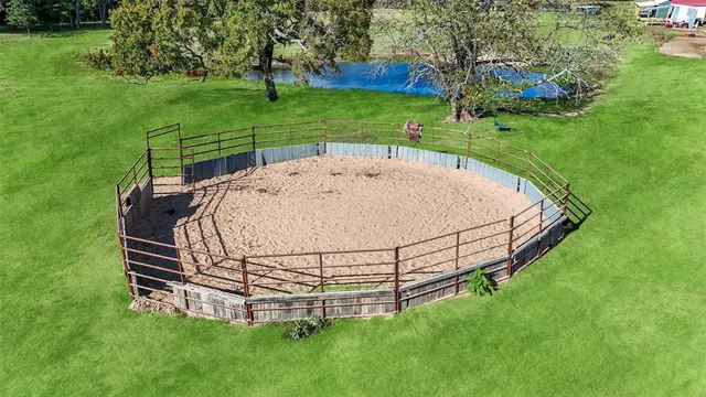 a view of a bike parked next to a yard