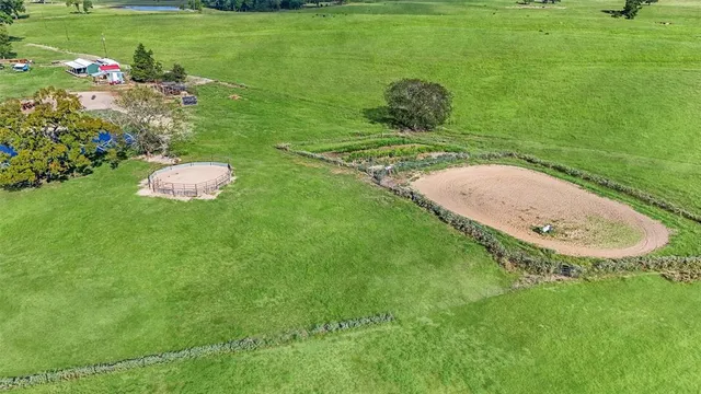 a backyard of a house with lots of green space