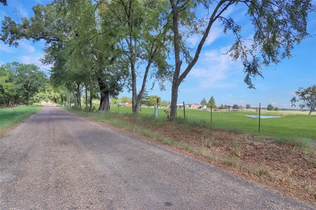 a view of lake with green space