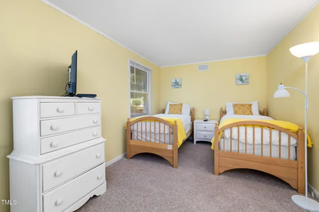 a kitchen with granite countertop a refrigerator stove and sink