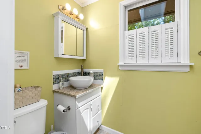 a bedroom with two beds and painted walls