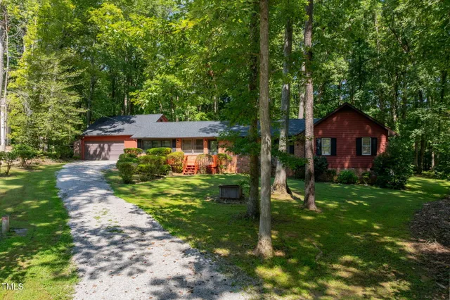 a picture of a room with a white wall and door