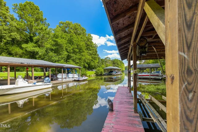 a view of a house with a yard porch and sitting area
