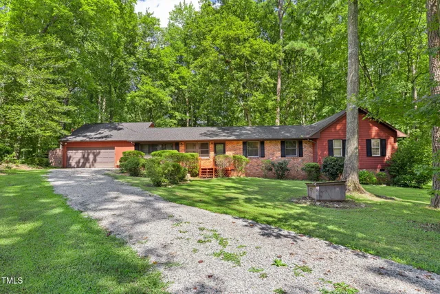 a picture of a room with a white wall and door