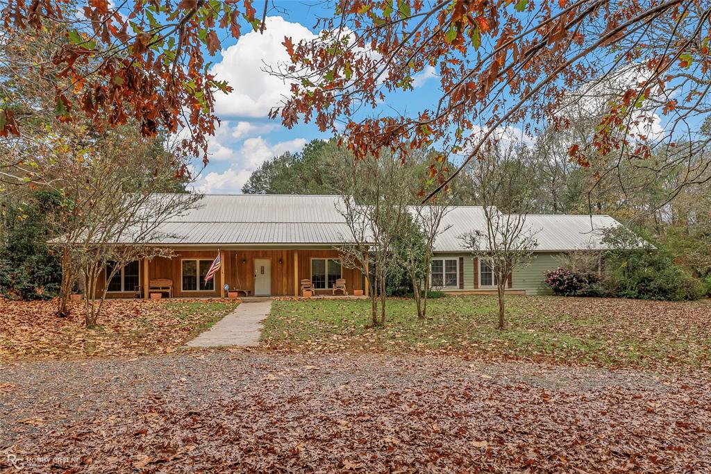 3100 Herren Road Doyline, LA 71023 - Photo 1 of 1 front view of a house with a yard