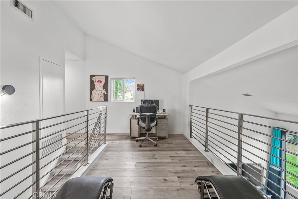 12720 Newport Avenue, Unit 18 Tustin, CA 92780 - Photo 14 of 37 a view of a workspace with furniture and a window