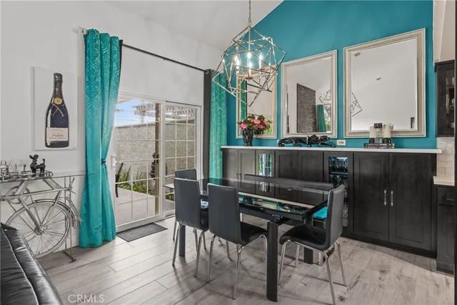 a room with a table and chairs in it