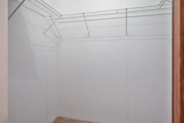 a view of a house with a snow in the yard