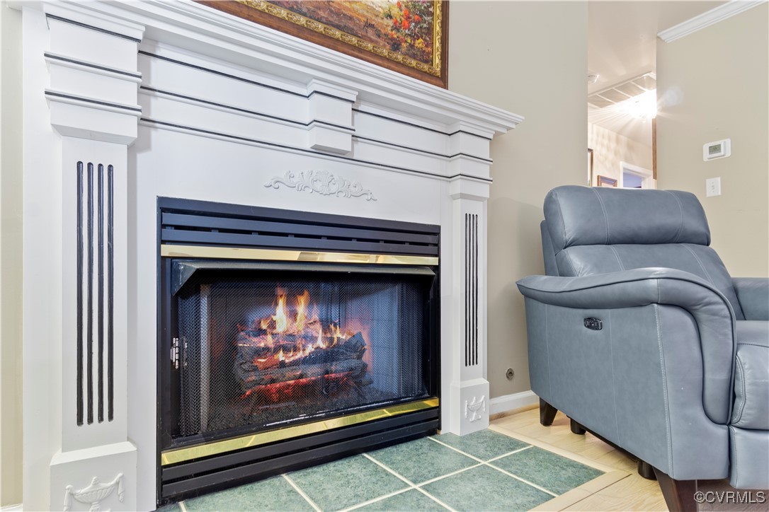 4824 Bristol Circle Williamsburg, VA 23185 - Photo 11 of 36 Details with crown molding and hardwood / wood-sty