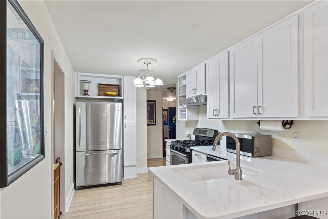 4824 Bristol Circle Williamsburg, VA 23185 - Photo 15 of 36 Kitchen with light stone countertops, appliances w